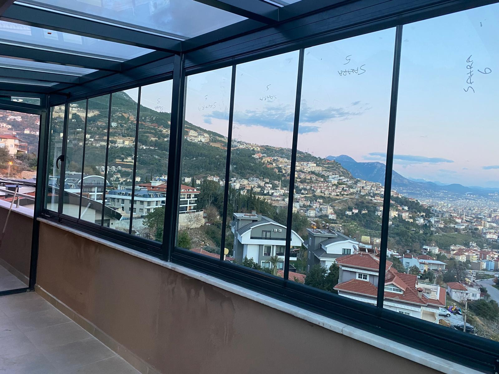 Dört Mevsim Balkon Keyfi: Alanya Cam Balkon Sistemleri.